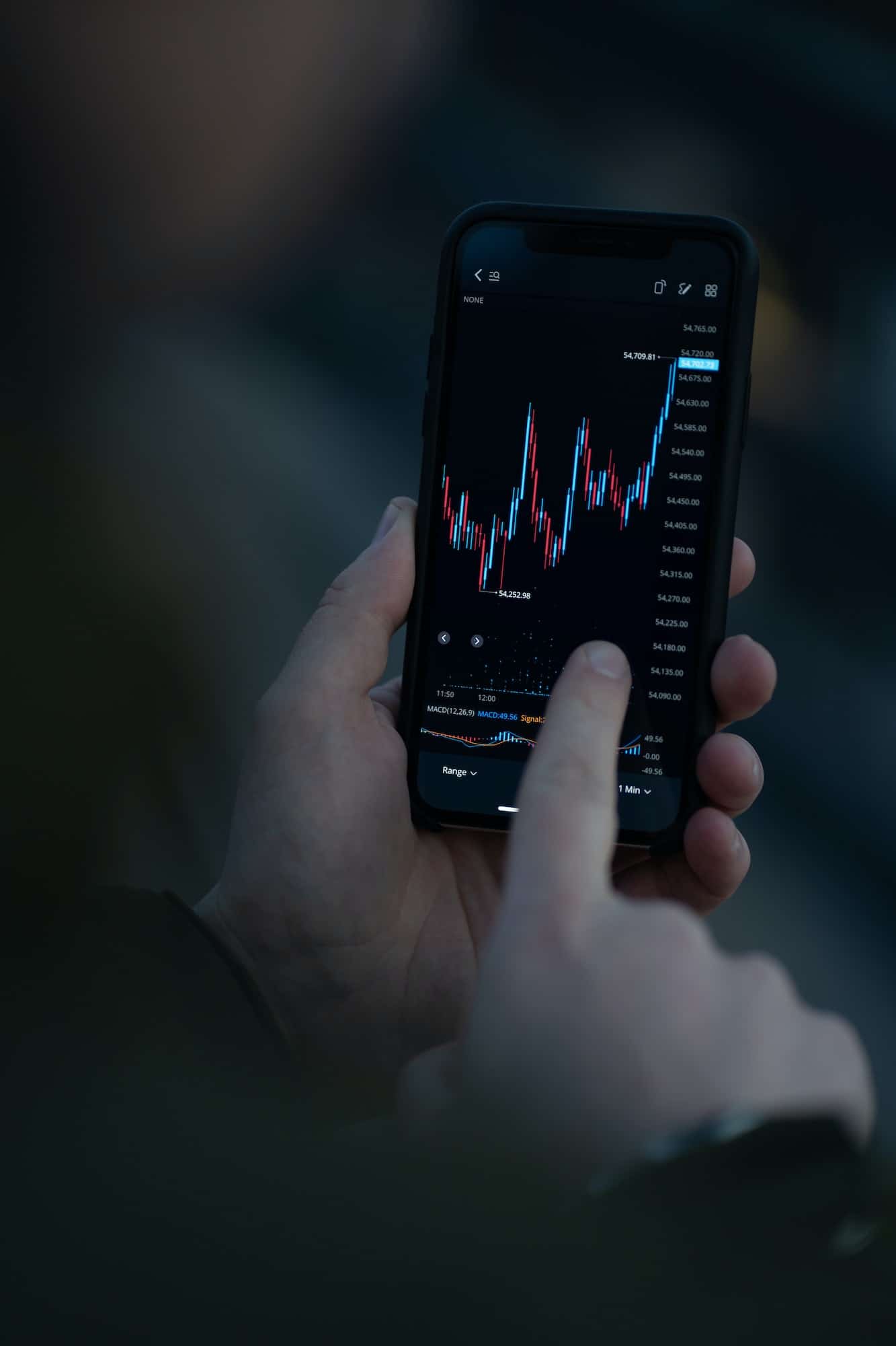 Businessman using a mobile app on an iPhone